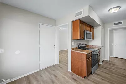 10025 W Coggins Drive, Sun City, AZ 85351 - Photo 13