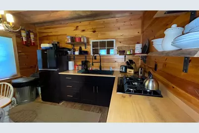 1261 Dirigo Road, Upper Enchanted Twp, ME 04945 - Photo 1