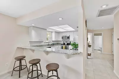 6680 Ilex Circle #3D, Naples, FL 34109 - Photo 9