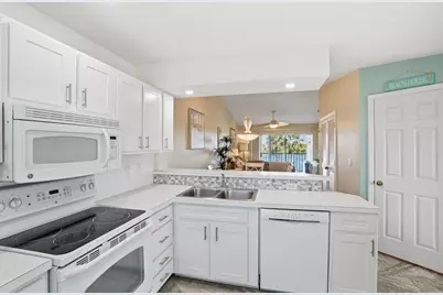 1175 Mainsail Dr #715, Naples, FL 34114 - Photo 11