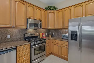 8987 Cherry Oaks Trail #202, Naples, FL 34114 - Photo 3