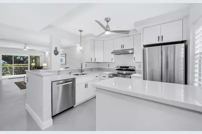 3055 Riviera Drive #102, Naples, FL 34103 - Photo 3