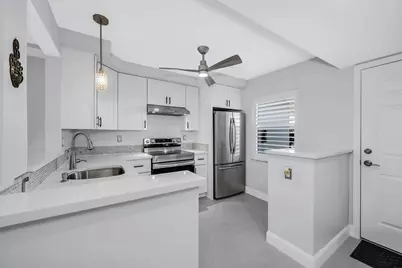 3055 Riviera Drive #102, Naples, FL 34103 - Photo 3