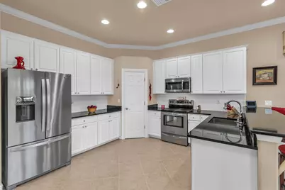 6806 Bent Grass Drive, Naples, FL 34113 - Photo 7