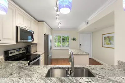 3072 Sandpiper Bay Circle #M103, Naples, FL 34112 - Photo 7