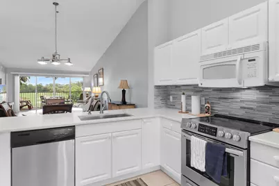 1100 Eastham Way #A302, Naples, FL 34104 - Photo 5