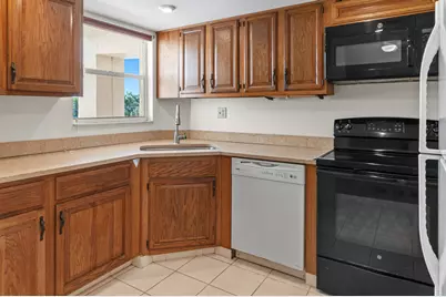 21 High Point Circle E #305, Naples, FL 34103 - Photo 11