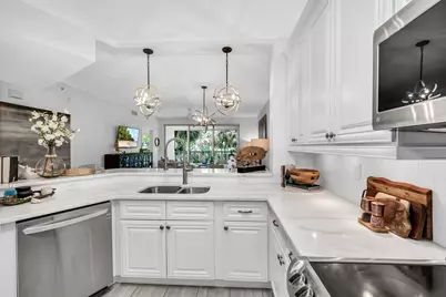 7671 Pebble Creek Circle #105, Naples, FL 34108 - Photo 13