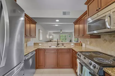 145 Robin Hood Circle #104, Naples, FL 34104 - Photo 9
