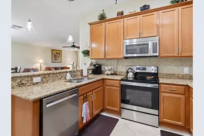 8647 Genova Court, Naples, FL 34114 - Photo 13