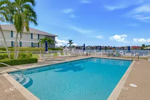 671 W Elkcam Cir, Marco Island, FL 34145 - Photo 17