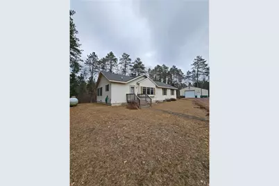 W9424 Lakewood Road, Spooner, WI 54801 - Photo 1
