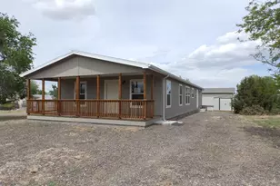 1038 S Saddlerock Dr, Pueblo West, CO 81007 - Photo 1