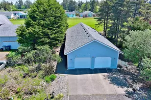 566 Canal Dr NE, Ocean Shores, WA 98569 - Photo 1