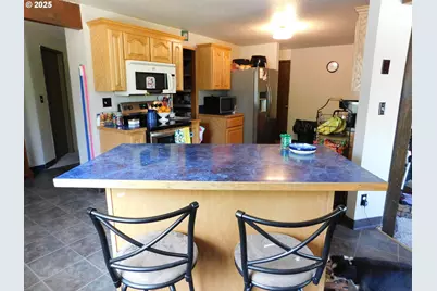 231 NE Darrell Ave, Winston, OR 97496 - Photo 11