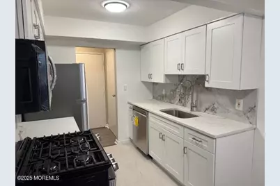 56 Stonehurst Boulevard #C, Freehold, NJ 07728 - Photo 1