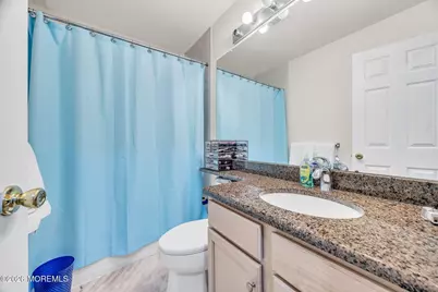 155 Point Of Woods Boulevard, Morganville, NJ 07751 - Photo 29