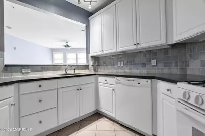 1308 Cedar Village Boulevard #308, East Brunswick Township, NJ 08816 - Photo 11