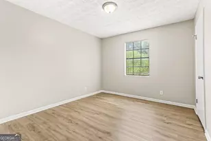 1152 Holly Hills Dr SW, Lilburn, GA 30047 - Photo 13