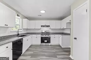 1444 Meadowind Ct SW, Conyers, GA 30094 - Photo 3