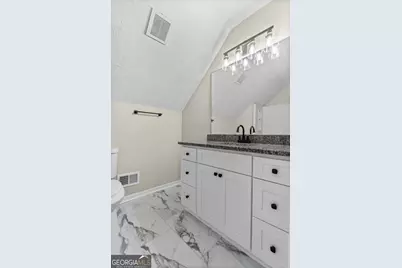 1444 Meadowind Court SW, Conyers, GA 30094 - Photo 13