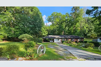 4884 Maurice Drive NW, Lilburn, GA 30047 - Photo 1