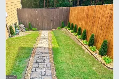 7756 Wrothham Circle, Atlanta, GA 30349 - Photo 25