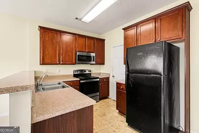7676 Rutgers Circle, Fairburn, GA 30213 - Photo 13