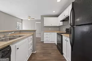 5458 Rolling Oak Ln, Buford, GA 30518 - Photo 7