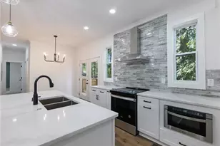 2438 Shadburn Ferry Dr, Buford, GA 30518 - Photo 11