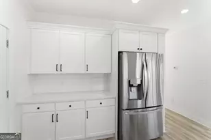 5560 Pilgrim Point Ext, Cumming, GA 30041 - Photo 9