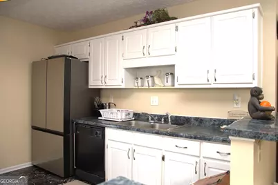 5718 Hidden Brook Circle, Atlanta, GA 30349 - Photo 5