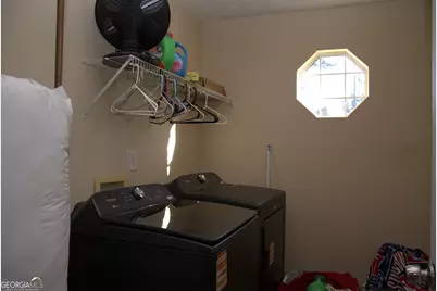 5718 Hidden Brook Circle, Atlanta, GA 30349 - Photo 25