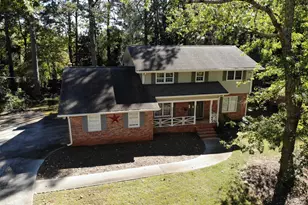 5781 Four Winds Dr SW, Lilburn, GA 30047 - Photo 1