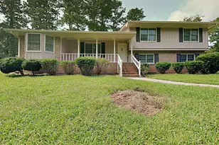 551 Village Green Ct SW, Lilburn, GA 30047 - Photo 1