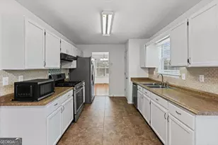 2242 Rocksram Ct, Buford, GA 30519 - Photo 17