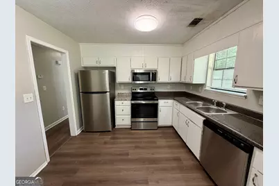 5663 Saint Thomas Drive, Lithonia, GA 30058 - Photo 5