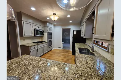 5525 Wedgewood Court SW, Lilburn, GA 30047 - Photo 11