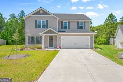 10050 Woodland Cove, Brunswick, GA 31525 - Photo 1