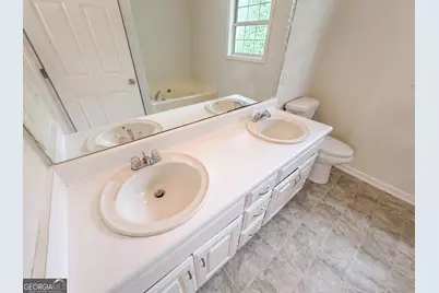 4615 Creek Bluff Drive, Buford, GA 30518 - Photo 21