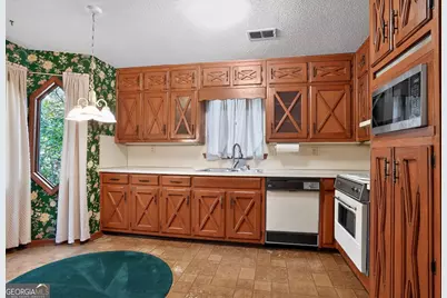 612 Tom Smith Road SW, Lilburn, GA 30047 - Photo 13