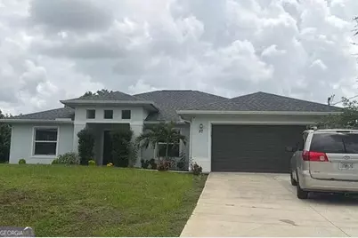 57 Bruce Avenue S, Lehigh Acres, FL 33976 - Photo 1