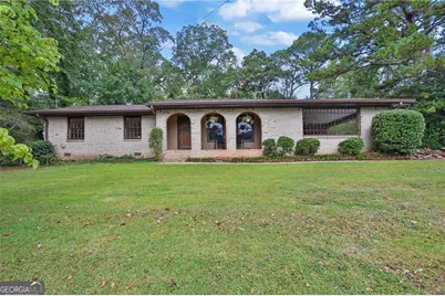 4847 Shadowwood Court SW, Lilburn, GA 30047 - Photo 1
