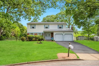 32 Chatham Woods Drive, Centereach, NY 11720 - Photo 1