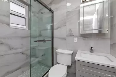27-09 Utopia Parkway, Flushing, NY 11358 - Photo 11