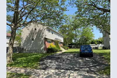 85-87 Washington Street, East Islip, NY 11730 - Photo 1