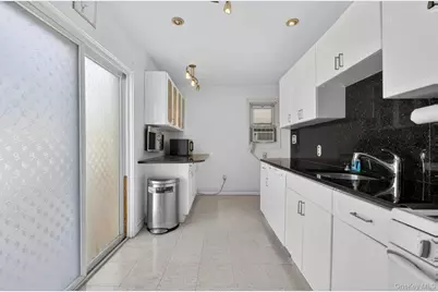 90-06 210th Place, Queens Village, NY 11428 - Photo 15
