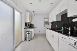 90-06 210th Pl, Queens Village, NY 11428 - Photo 15