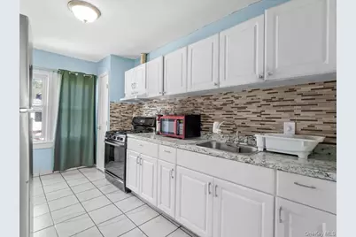 72 Pleasant Avenue, Roosevelt, NY 11575 - Photo 7