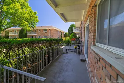 1 Toms Point Lane #Building 5, Unit 9J, Port Washington, NY 11050 - Photo 11